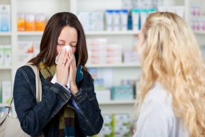 Photo is a woman suffering from the flu coming to Jacobson's Pharmacy in Yonkers, New York for testing.